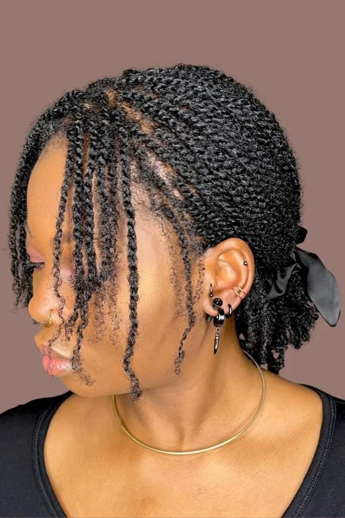 someone with twist hairstyle for natural hair